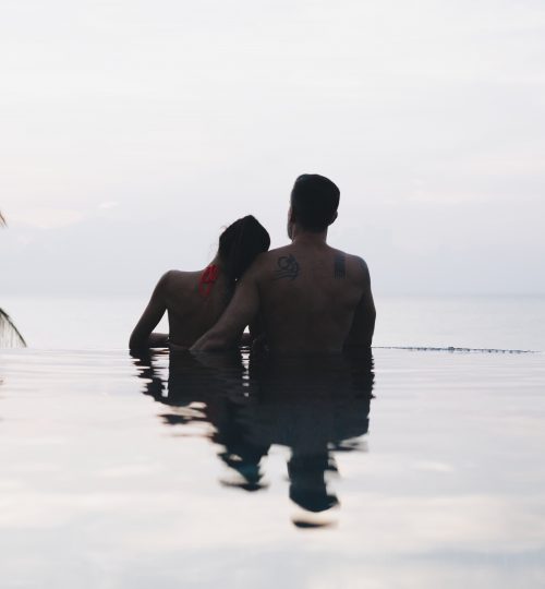 Honeymooners watching the sunset