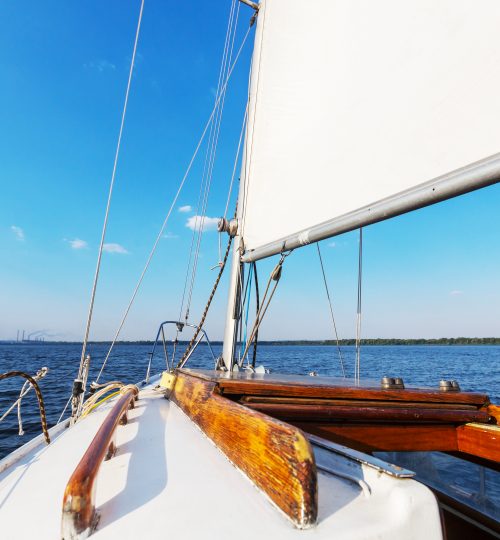 Sailing yacht on big river