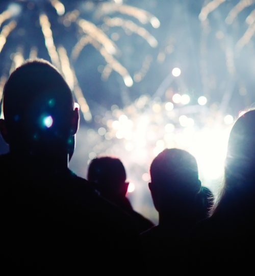 Crowd watching fireworks and celebrating new year